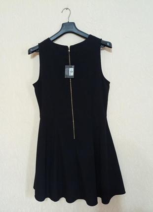 Черное новое платье 46-48 размера расклешонное к низу с молнией3 фото