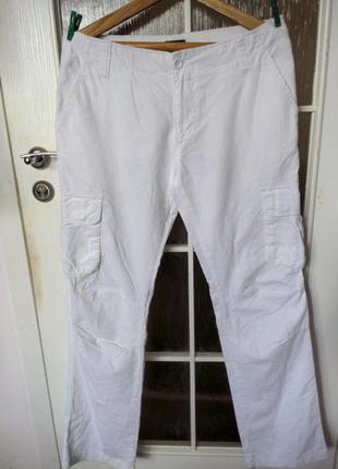 Льняные штаны от известного бренда.1 фото