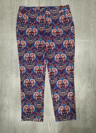 Разноцветные брюки с карманами1 фото