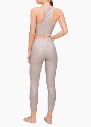 Бежеві спортивні жіночі легінси calvin klein 7/83 фото
