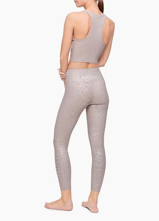 Бежеві спортивні жіночі легінси calvin klein 7/86 фото