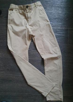 Светлые котоновые брюки на мальчика 13-14лет рост 164см