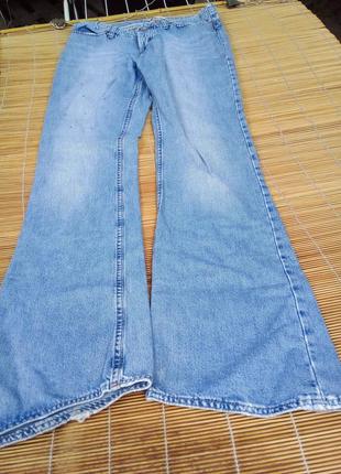 Винтажные расклешенные джинсы2 фото