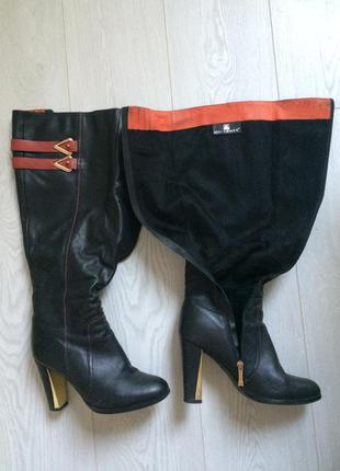 Женские кожаные сапоги "mallanee" на каблуке