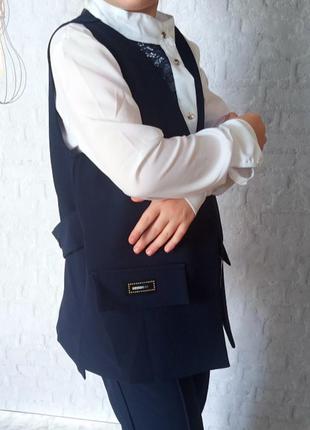 Школьный костюм на девочку .жилетка + брюки .качество супер5 фото