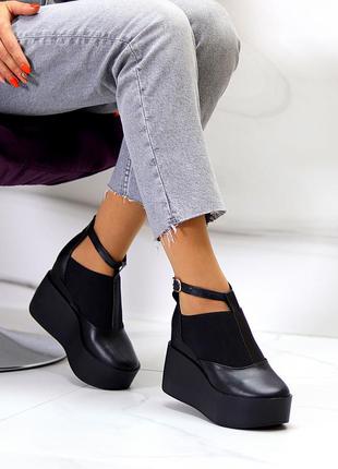Модельные кожаные черные женские туфли натуральная кожа на платформе танкетке10 фото