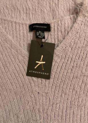 Очень красивый и стильный брендовый вязаный свитер сиреневого цвета.8 фото