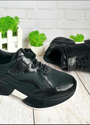 Стильные черные кроссовки на платформе5 фото
