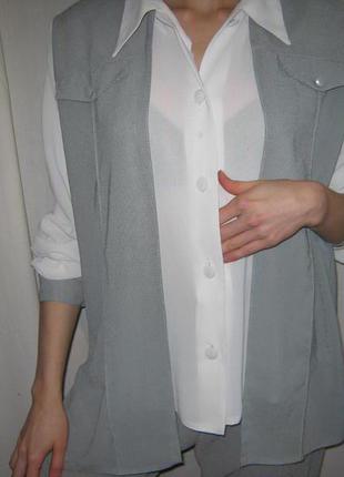 Красивий і модний жіночий костюм - штани + блуза б/у, розмір 46-485 фото