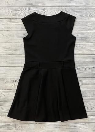 Черное трикотажное школьное платье со стразами2 фото