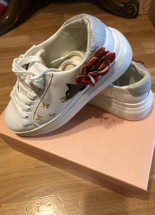 Кроссовки женские pregunta