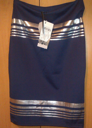 Эффектная темно-синяя юбка с серебряными полосами5 фото