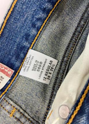 Джинсові шорти з необробленим низом levis7 фото