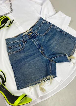 Джинсові шорти з необробленим низом levis2 фото