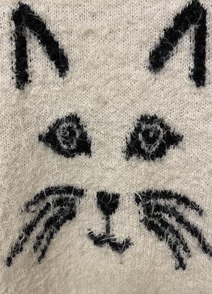 Очень красивый и стильный брендовый вязаный свитер с котом.10 фото