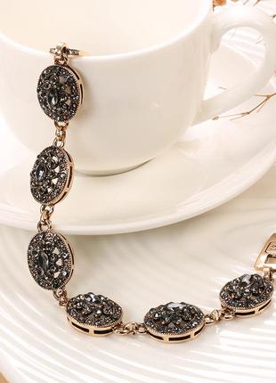 Шарм браслет в стилі бохо з сірими кристалами етнічний