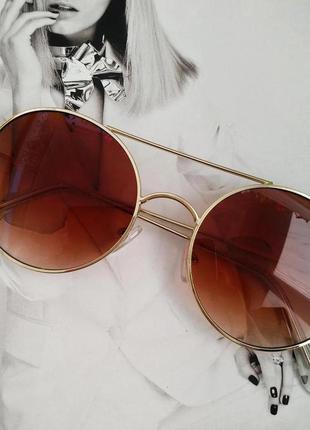 Солнцезащитные круглые очки с цветной линзой коричневый1 фото