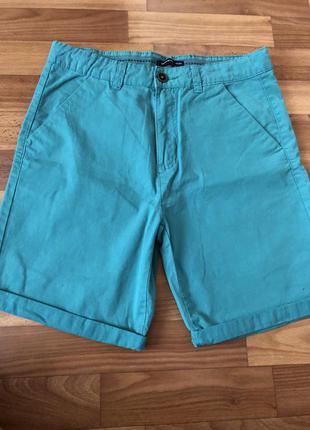 Шорти чінос