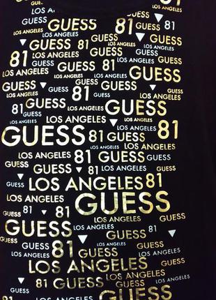 Женская футболка бренда guess.3 фото