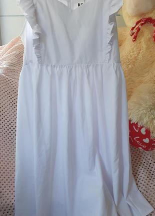 Біле плаття із завищеною талією3 фото