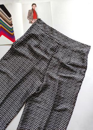 Чорні штани-кюлоти з дрібним білим принтом у кавові зерна zara.4 фото