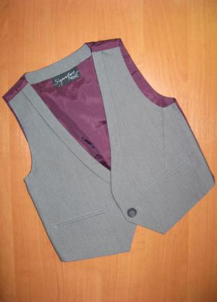 Жилетка "next" размер 9-12 мес. рост 80 см.