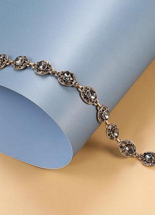 Шарм-браслет в стиле бохо с серыми кристаллами3 фото