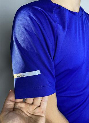 Nike спортивна футболка синя сітчаста3 фото