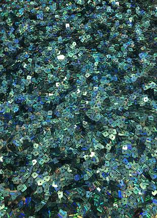 Паеточная ткань на сетке голубая новая.