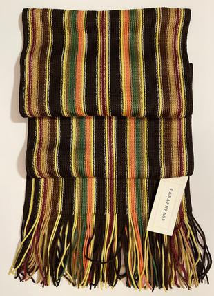 Очень красивый и стильный брендовый вязаный шарф в разноцветную полоску.
