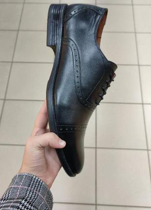 Черные кожаные мужские туфли на шнурке и каблуке2 фото