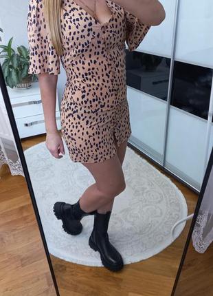 Скуня з клошними рукавами