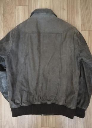 Классная мужская кожаная курточка дорогого бренда.3 фото