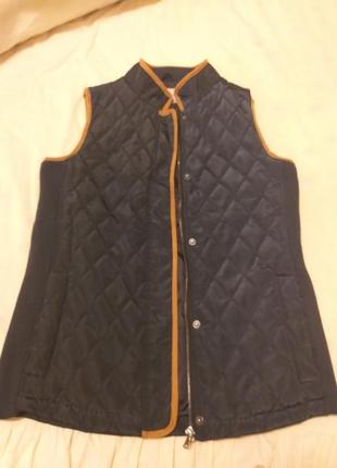 Жилетка