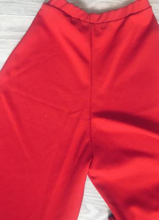 Червоні штани з воланом4 фото