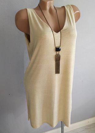 Элегантное трикотажное платье, туника, золотистый металлик.3 фото