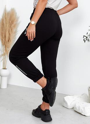 Женские трикотажные демисезонные спортивные штаны с манжетами (243 черные)3 фото
