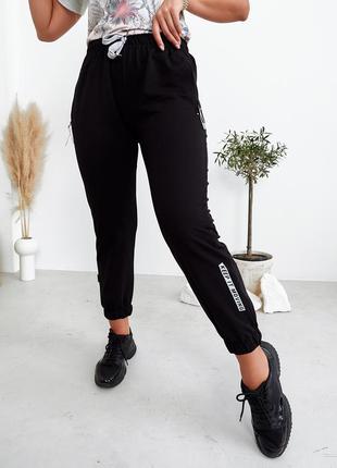 Жіночі трикотажні демісезонні спортивні штани з манжетами (243 чорні)2 фото