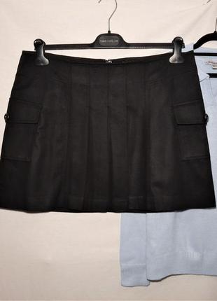 Осеняя шерстяная короткая юбка черного цвета