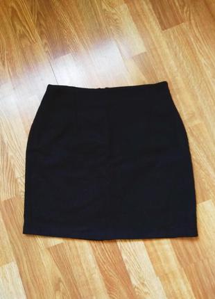 Черная шерстяная мини-юбка1 фото