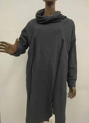 Стильне трикотажне плаття з кишенями