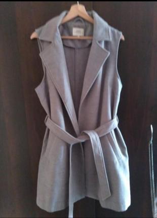 Жакети пальто без рукавів