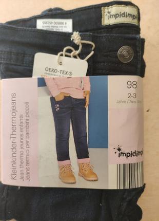 Утеплённые джинсы