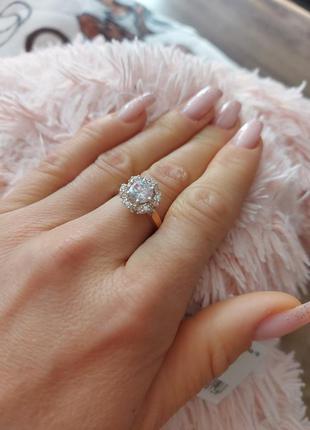 Срібна каблучка із золотими вставками