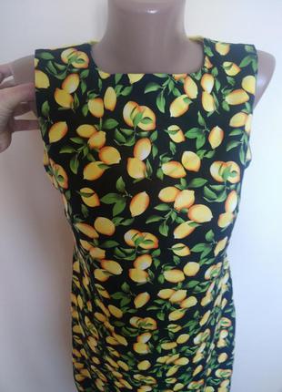 Платье черное в лимонах3 фото