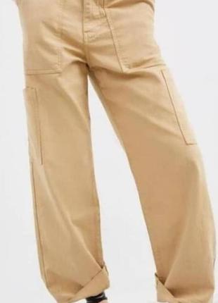 Бежеві штани карго zara