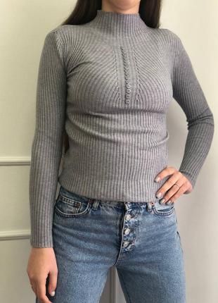 Гольф з гудзичками