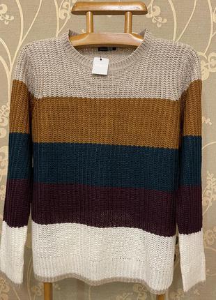 Очень красивый и стильный брендовый вязаный свитер в полоску.1 фото