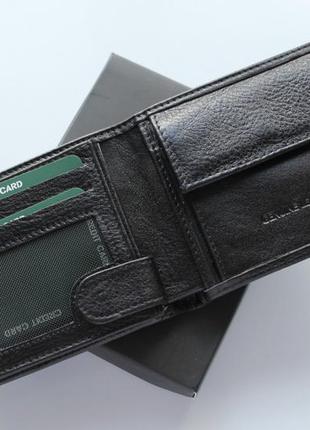 Стильний шкіряний чоловічий гаманець в стилі hugo boss3 фото