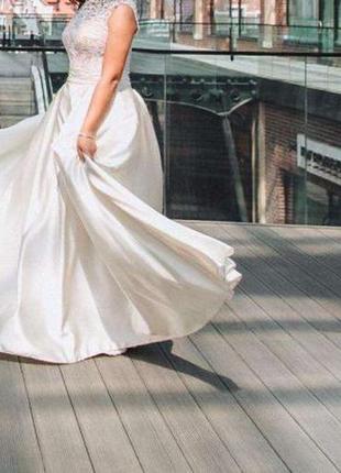 Продам шикарное свадебное платье (размер м-l)3 фото